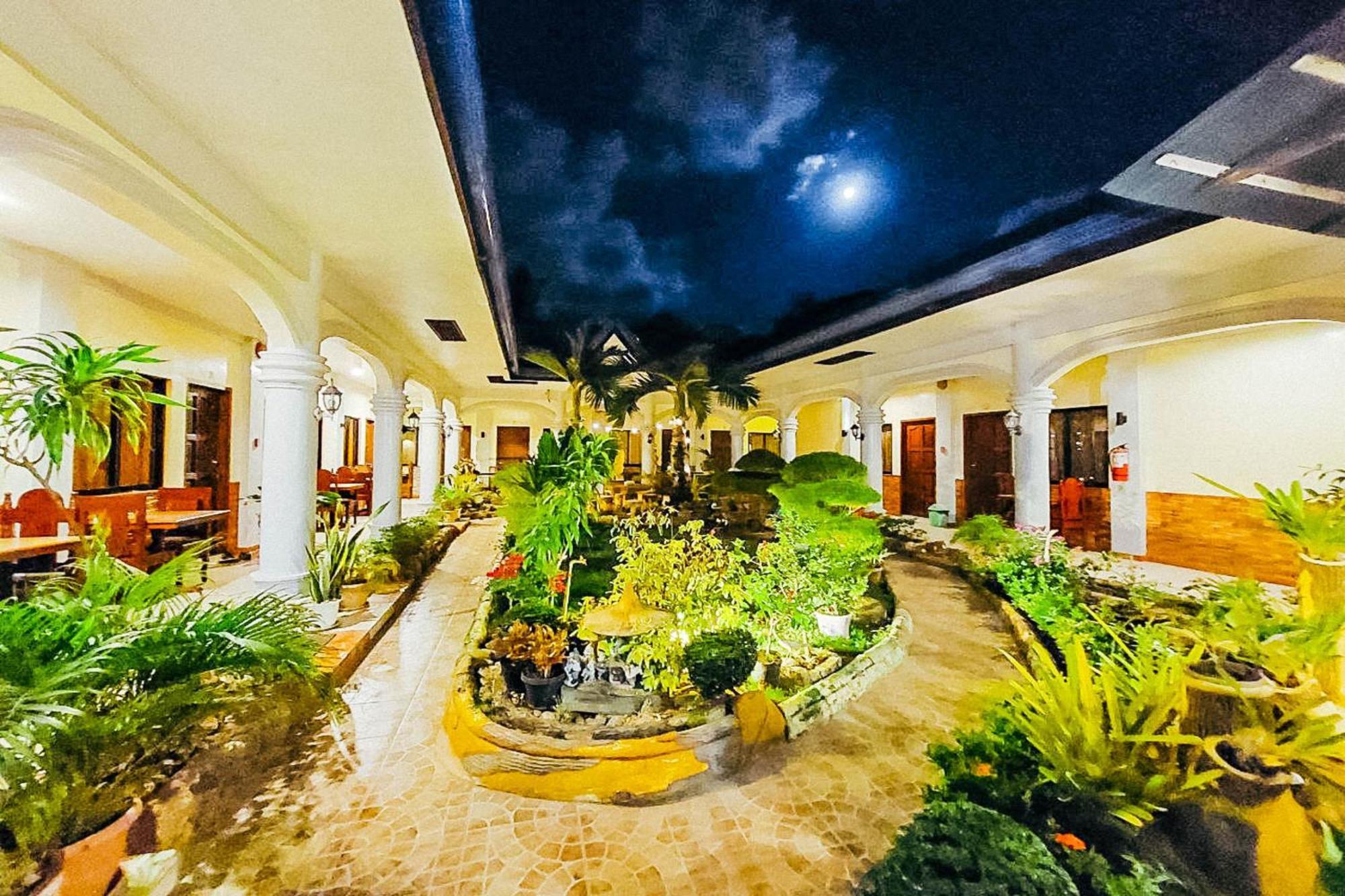 Mbg Travellers Inn Powered By Cocotel Puerto Princesa Exterior foto